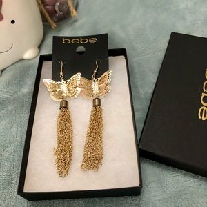 bebe gold-tone earrings.
